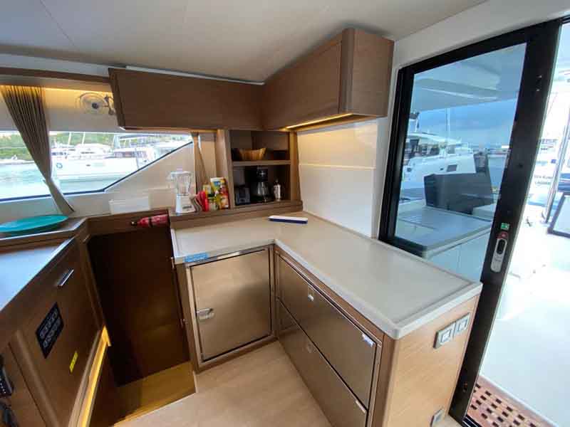 STARBOARD GALLEY WITH DUAL FRIDGES AND A FREEZER